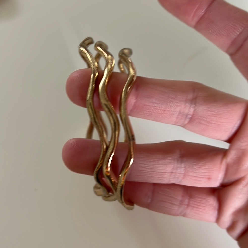 Three bangle bracelets